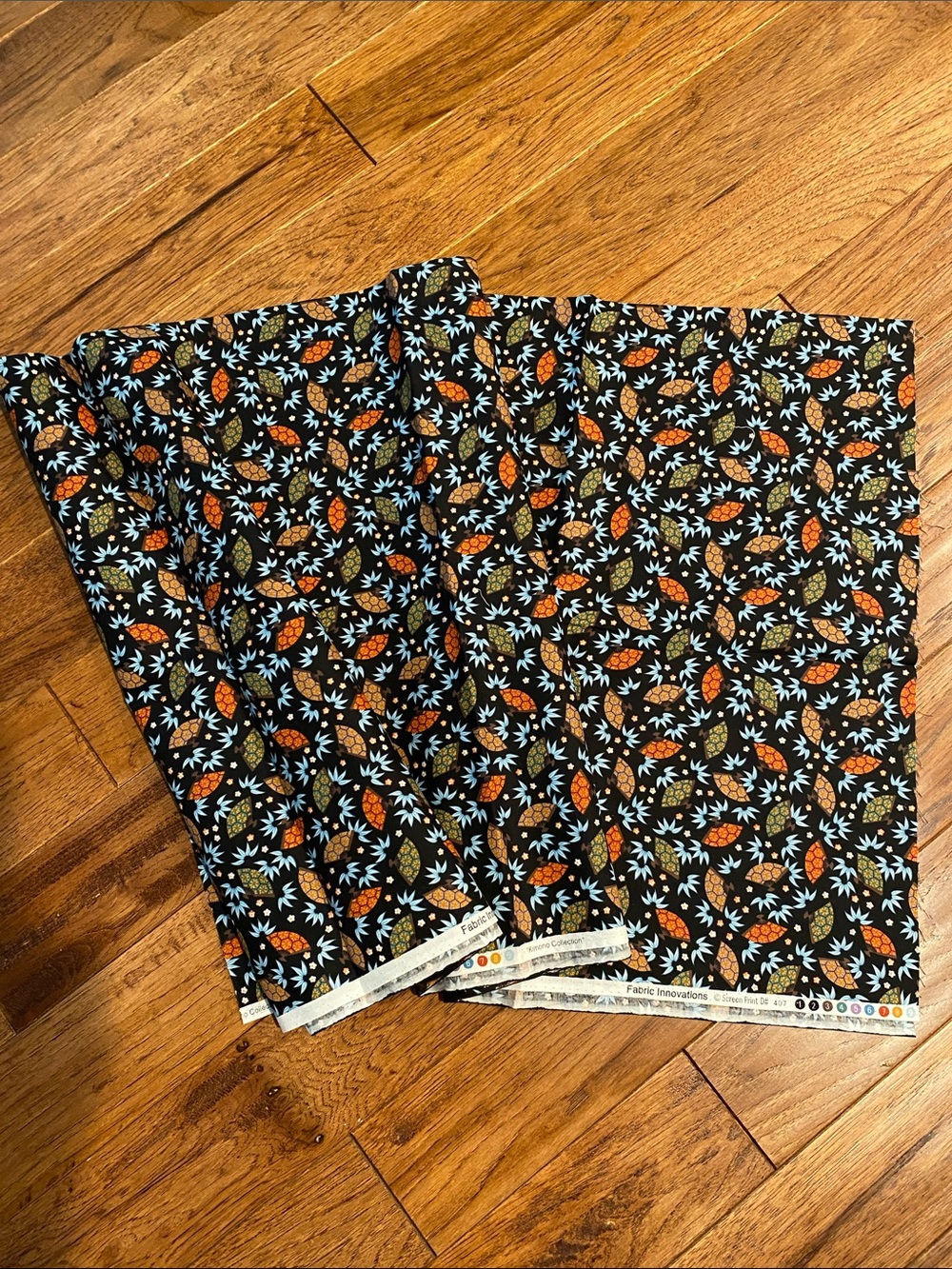 “Kimono collection” Black Floral Cotton Fabric with Orange & Light Blue Leaves